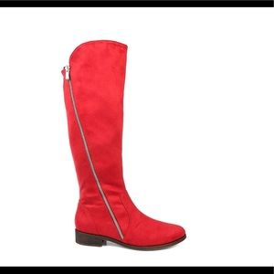 Knee high wide calf boots.